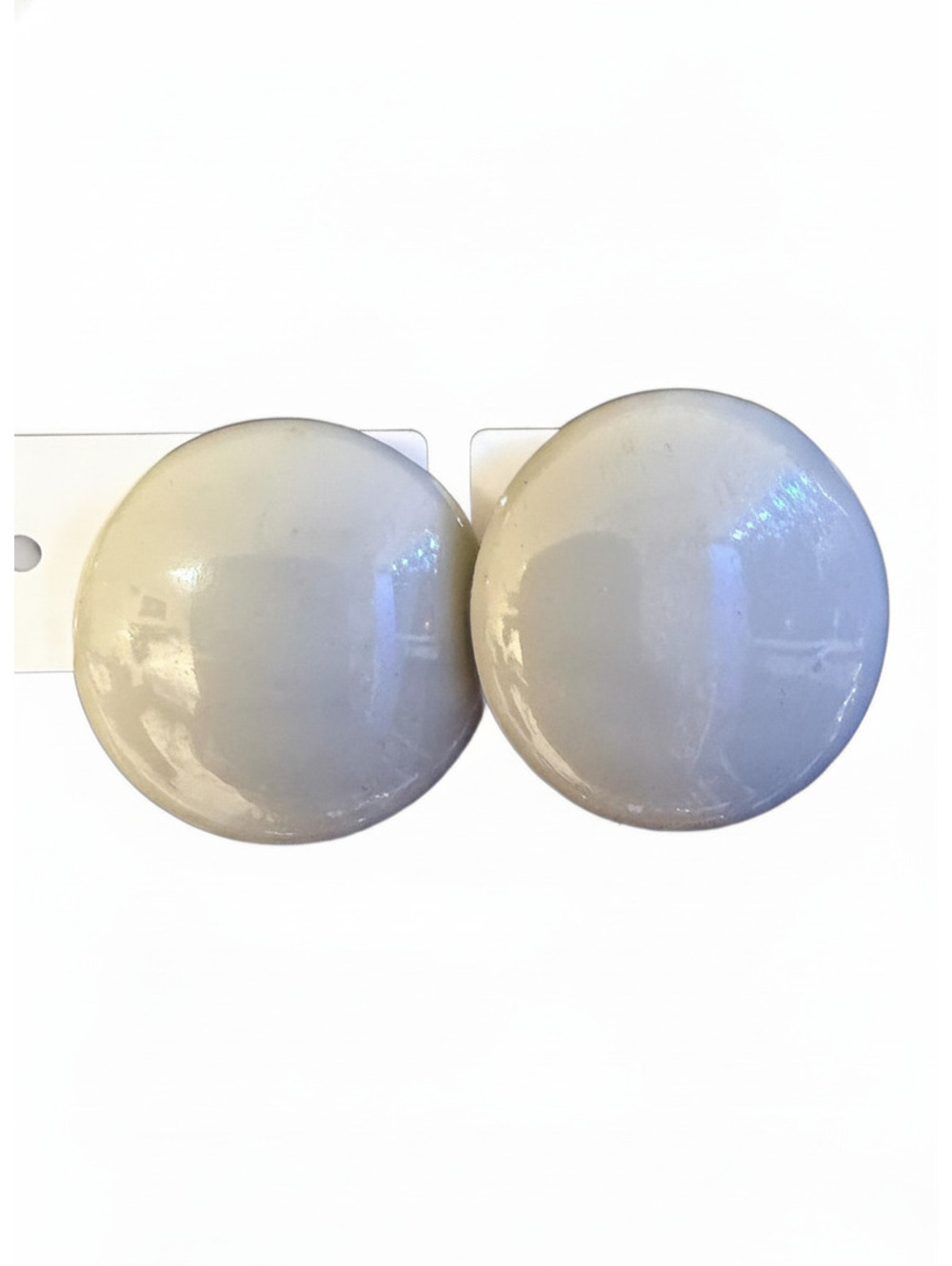 Large white round clip earrings